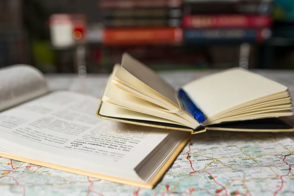 Open book and writing notebook
