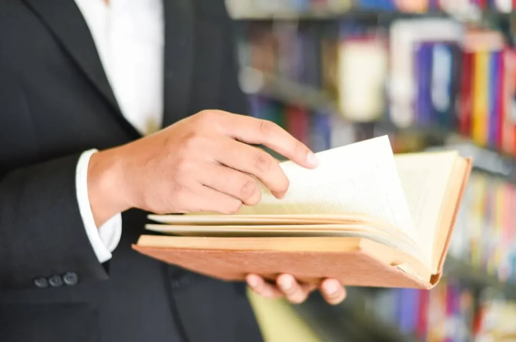 Reader holding an open book